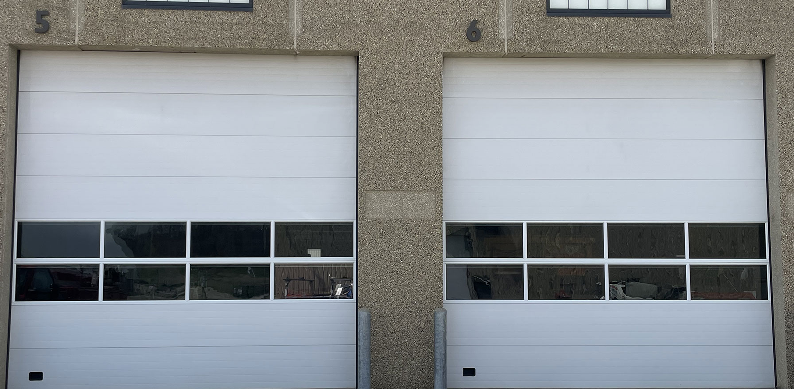 2 commercial garage doors.